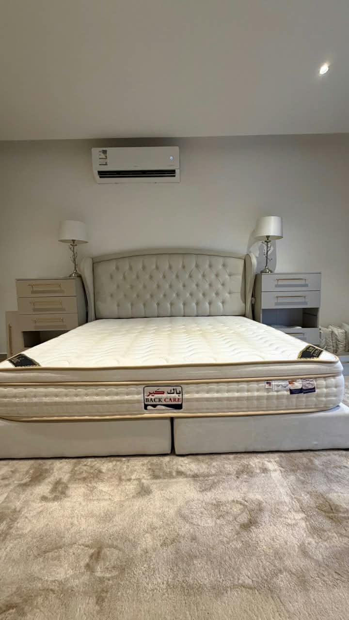 Bed and side tables reinstalled after a bedroom move