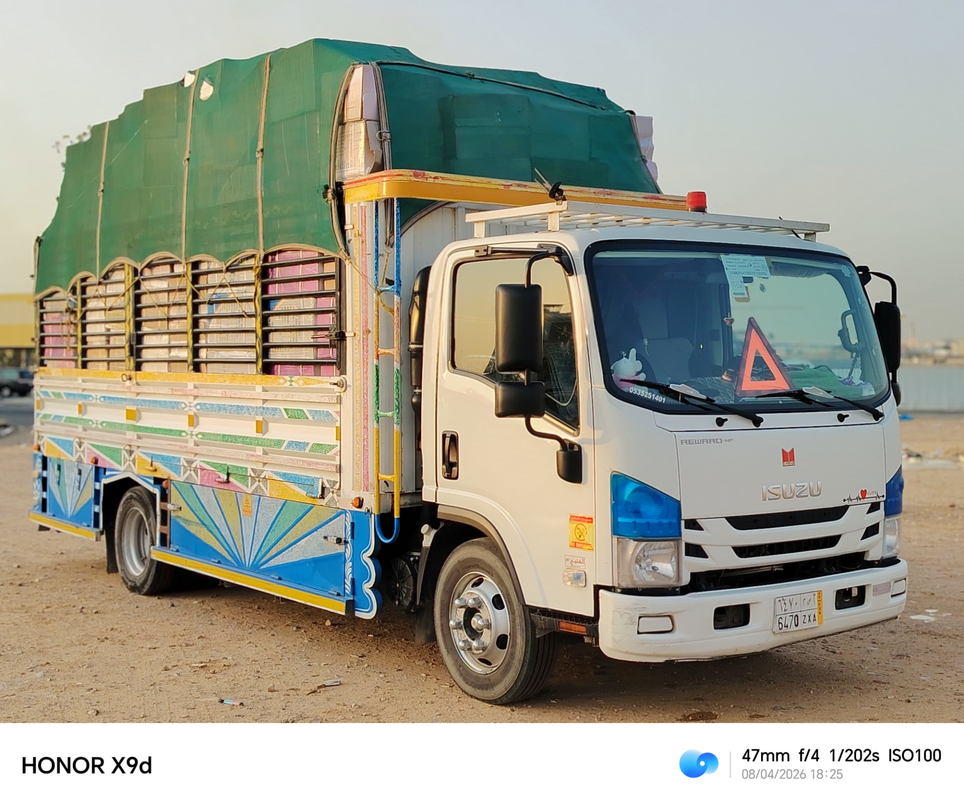 Loaded and covered moving truck ready for an intercity delivery