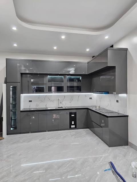 Kitchen cabinets dismantled, moved and refitted at a new address